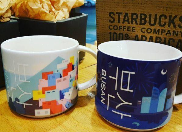 星巴克釜山市城市版本马克杯，展示多种色彩和釜山地标，适合各式釜山纪念品收藏。