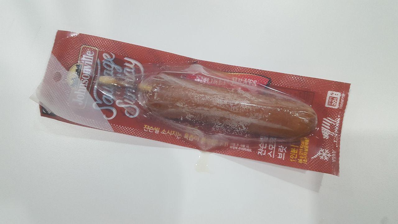 Johnsonville smoked bratwurst sausage in packaging, ready to be microwaved as part of the Mark meal recipe.