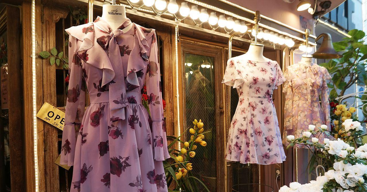 Exclusive and trendy fashion boutique in Hongdae displaying floral and elegant dresses.