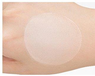 Texture and application of MISSHA's Sun Tension demonstrating the lightweight and smooth finish.