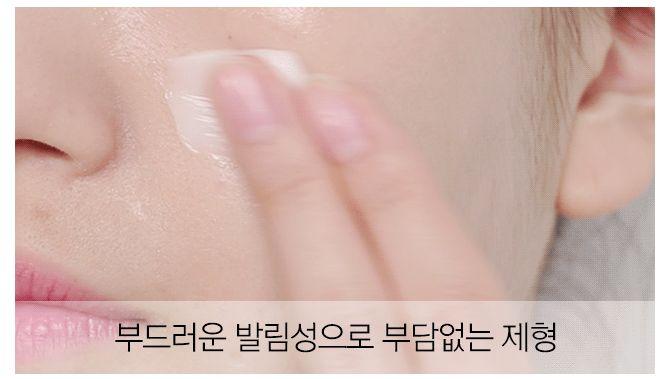 Application of MISSHA Madecanol Cream showcasing its smooth and non-greasy texture on the skin.