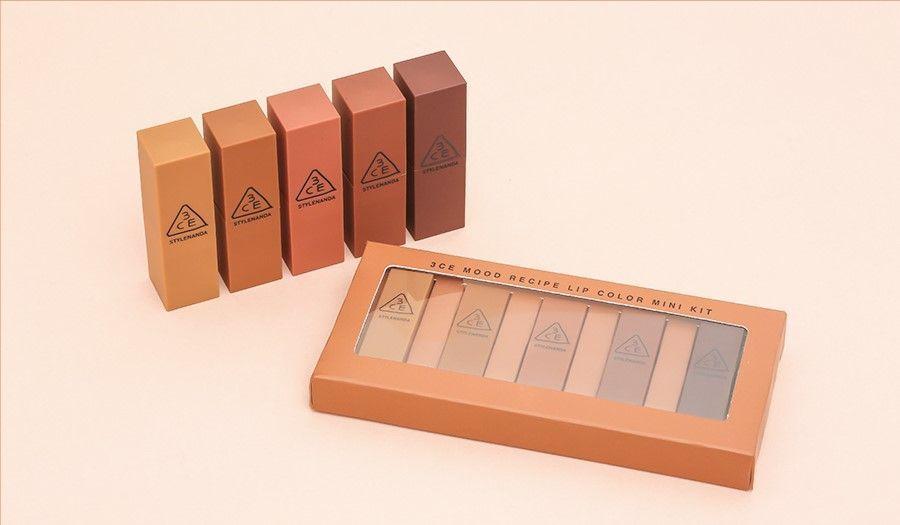 Close-up image of 3CE Matte Lipstick showcasing vibrant colors in a promotional setting.