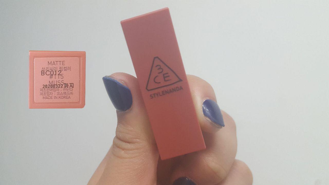 Detailed view of 3CE lipstick shade #115 MUSS, showcasing its soft rose tan hue.