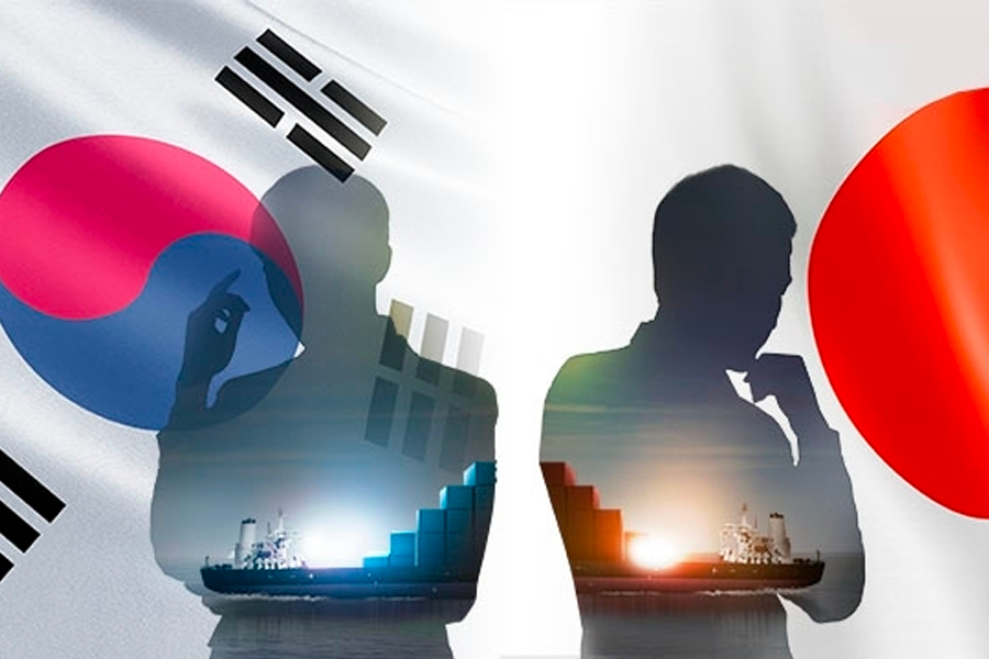 在韩国国旗和日本国旗前的两个半身人影,象征韩日之间的经济和政治关系。