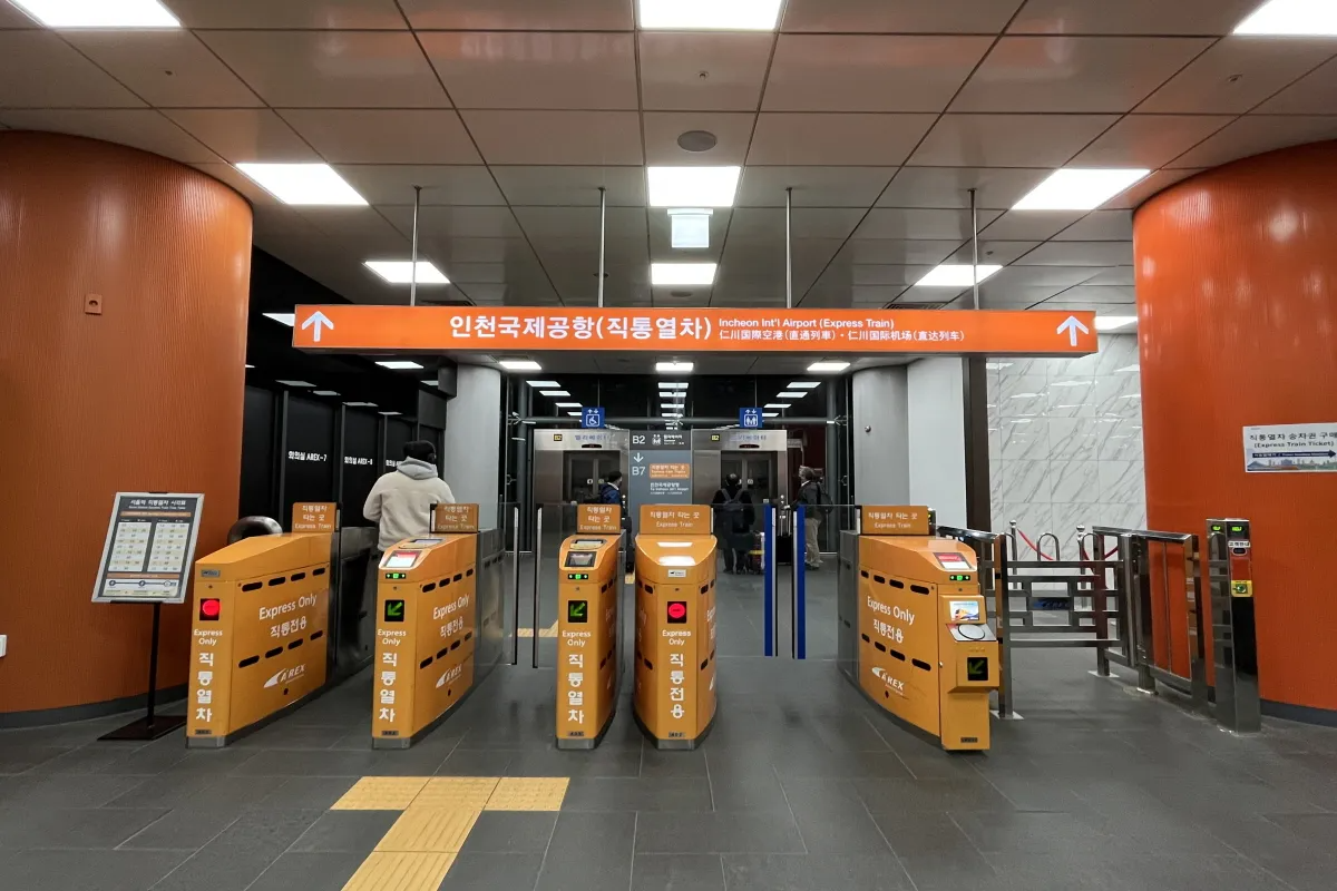 Scan QR code gates at AREX boarding platform for Incheon International Airport Express Train AREX gate