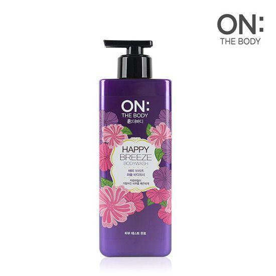 LG生活健康的ON THE BODY香水沐浴乳，900g，包装上描绘了多彩花卉图案，适合希望拥有持久花香沐浴体验的人。