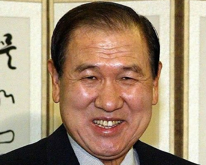 韓國前總統盧泰愚的照片，顯示其卸任後平和自信的狀態。