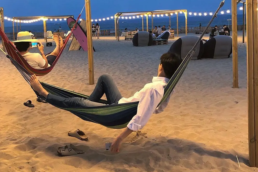 View of Hammocks at Surfyy Beach in Yangyang with a relaxing vacation atmosphere in Korea.