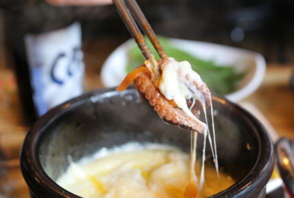 Octopus and cheese fondue create a dream combination at Myeongdong's Fatty Octopus restaurant.
