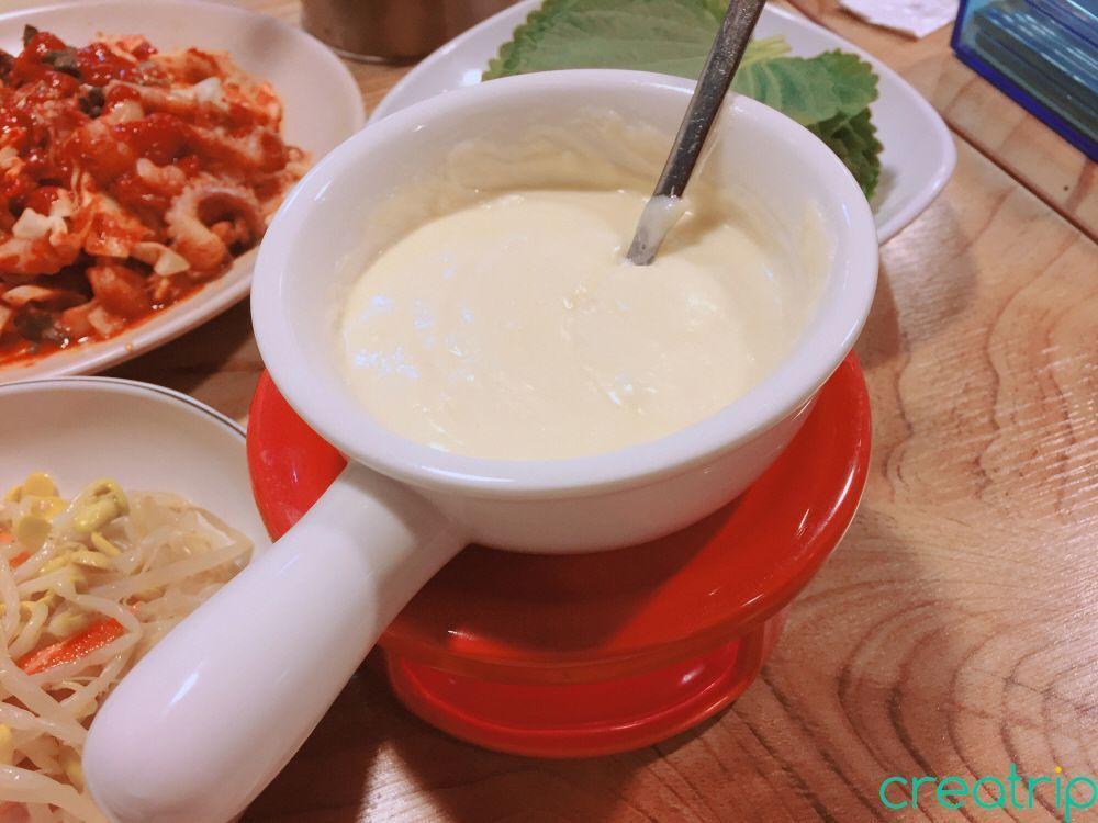 Cheese fondue served in a pot at Fatty Octopus restaurant in Myeongdong.