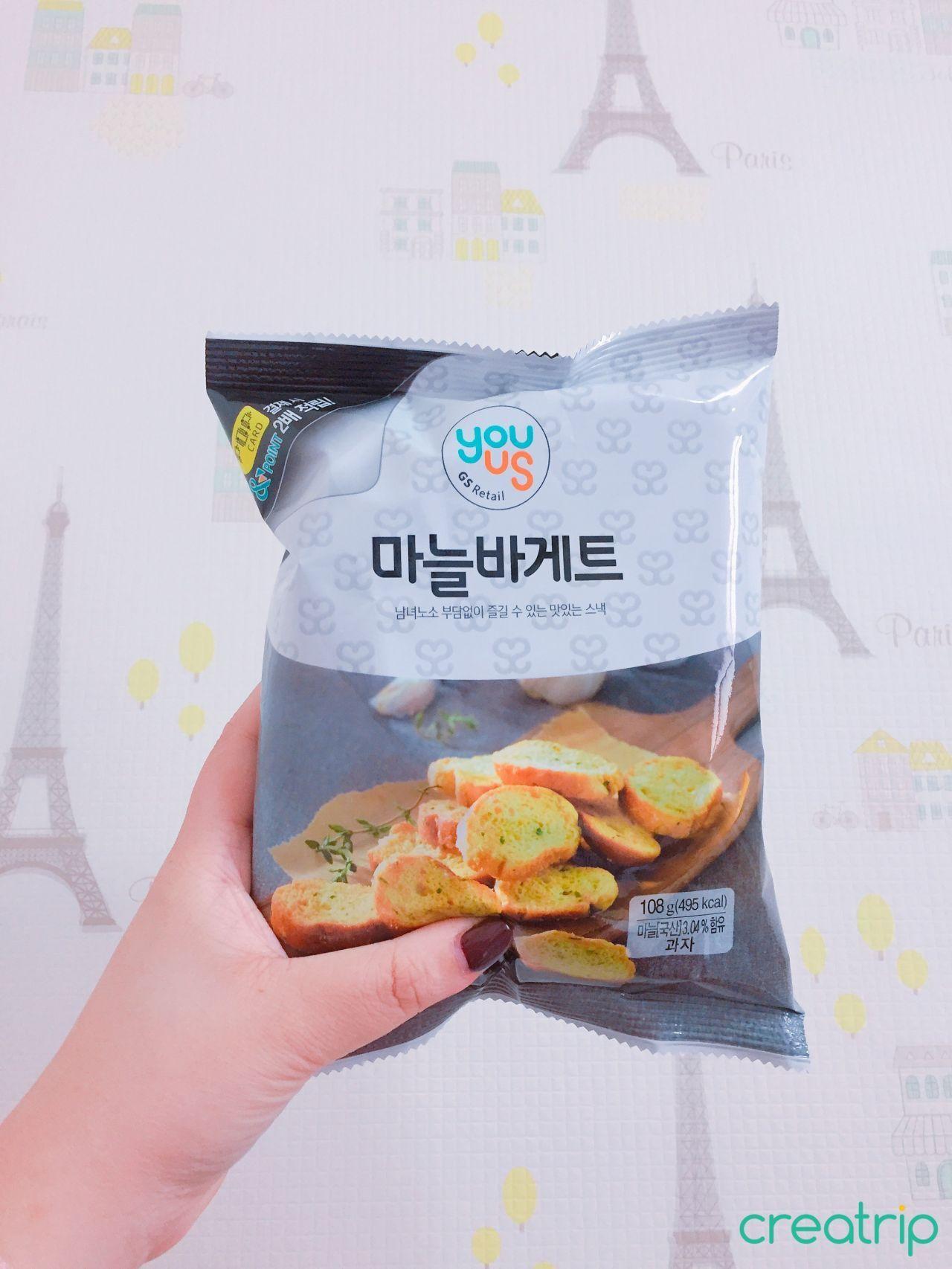 Garlic flavored bread snack package labeled in Korean as '마늘바게트'. An enticing culinary adventure awaits.