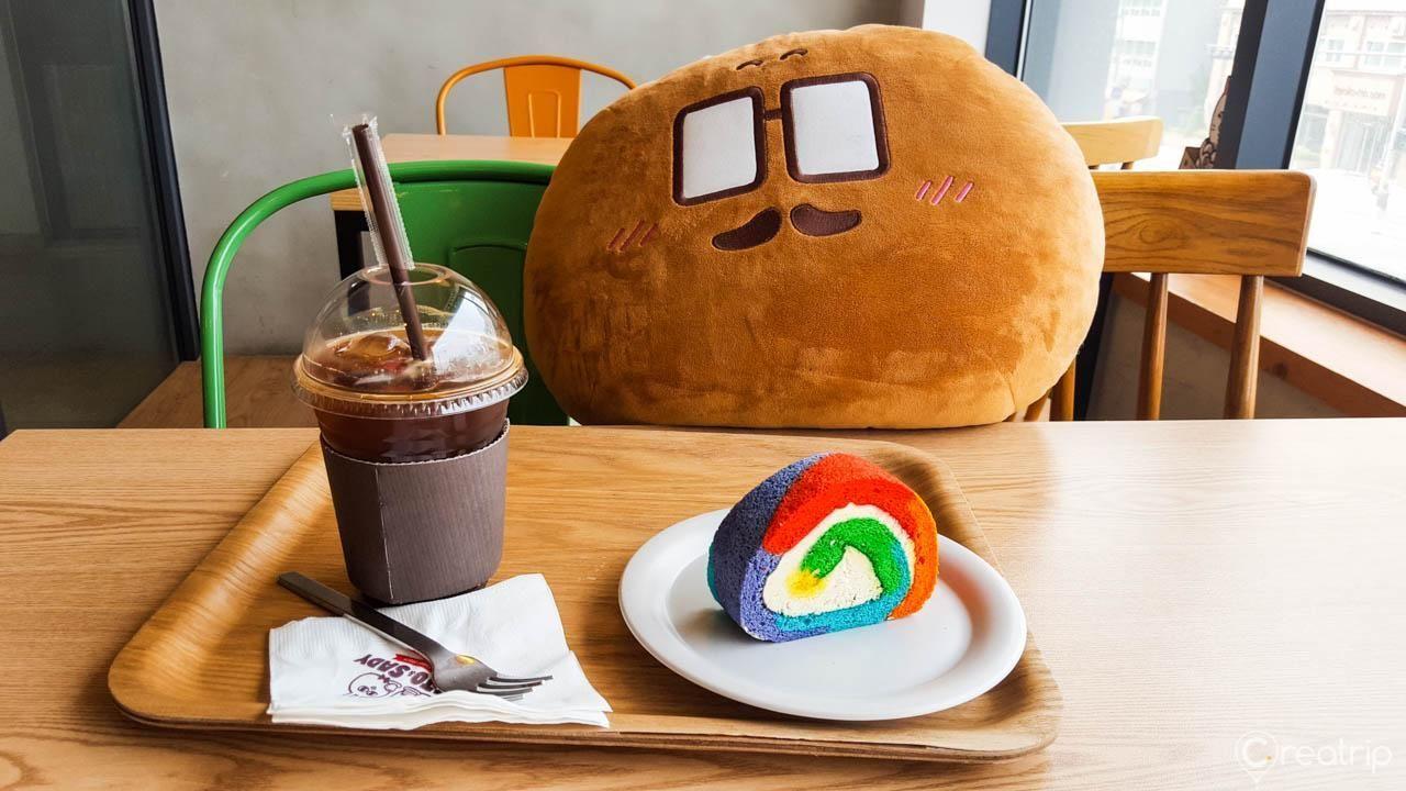 An inviting setup at MAJOandSADY Cafe in Seoul, Korea, with cartoon-themed interior and playful decorations.