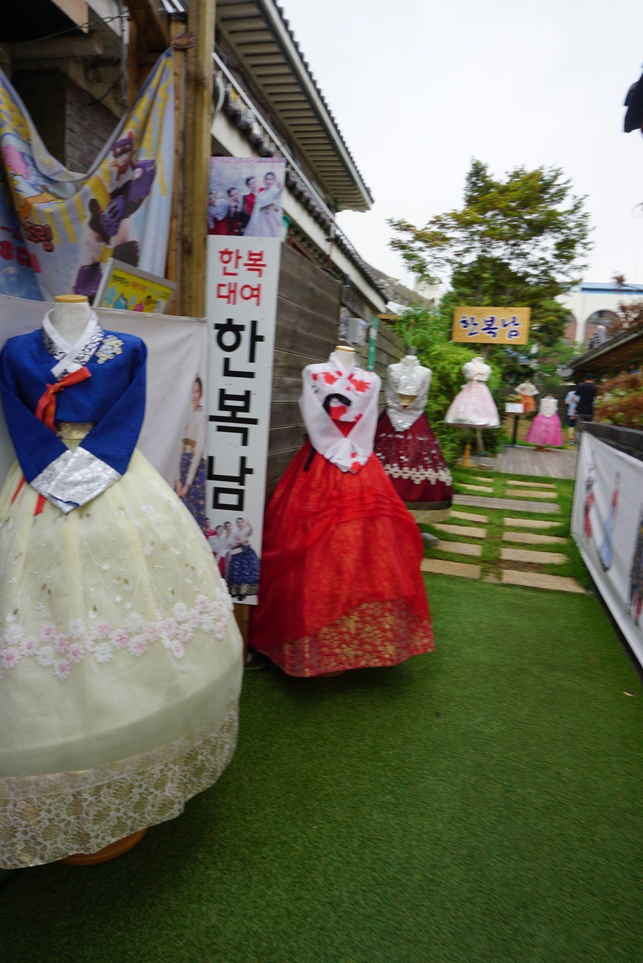 Entrance to Hanboknam, a Hanbok rental shop in Jeonju, featuring elegant traditional Korean attire for tourists.