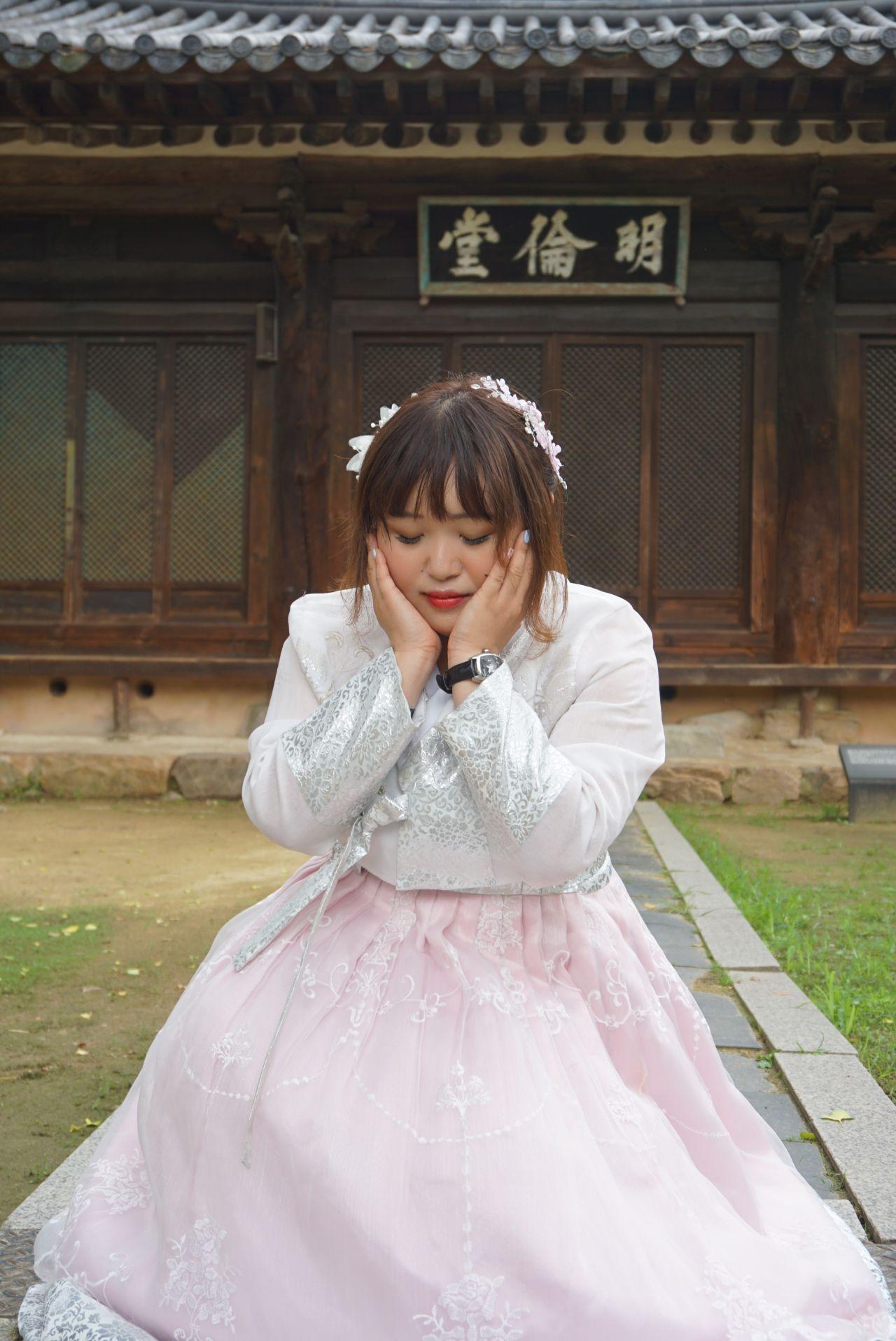 Stunning traditional Korean Hanbok outfits showcased in Jeonju's charming Hanok Village.
