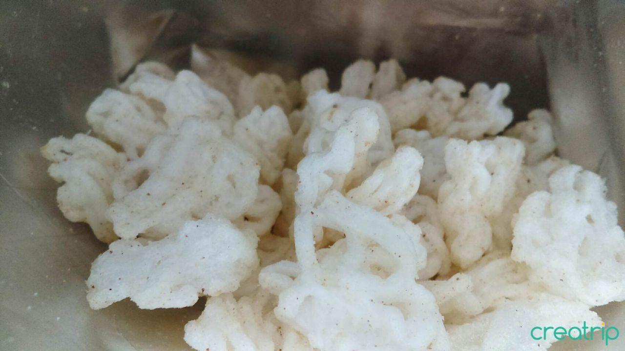 Interior view of CU noodle snack showing curled noodle-like chips