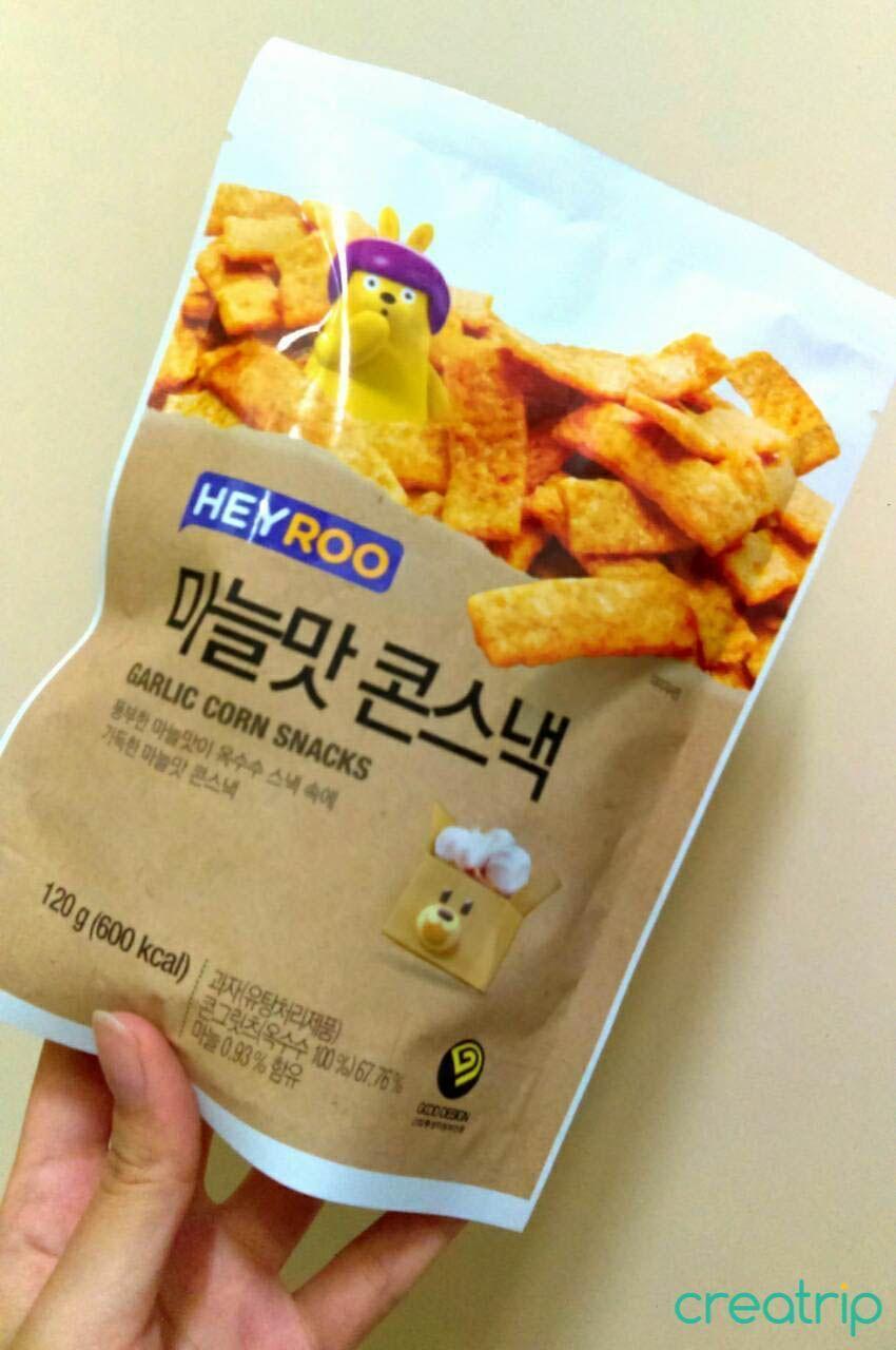Garlic corn snack packaging from CU Korean convenience store with cartoon illustrations