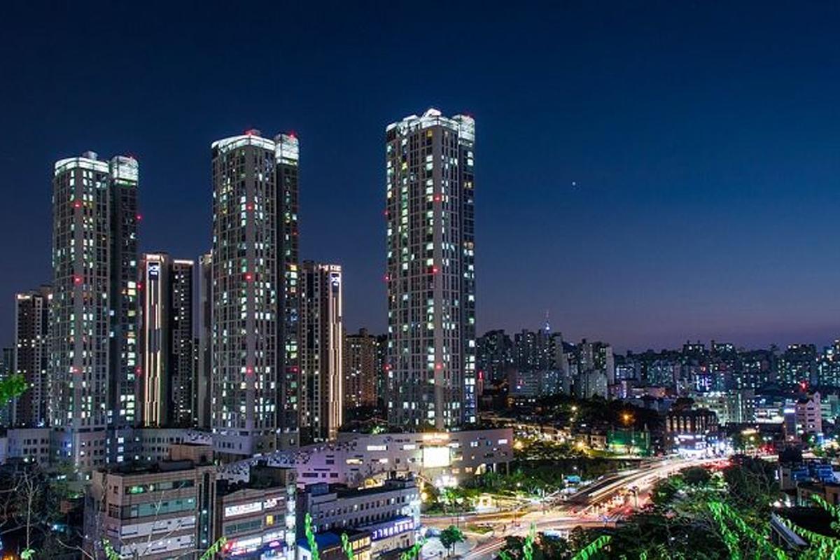 Skyscrapers of Seoul brilliantly lit up at night, creating a stunning landscape in the city center