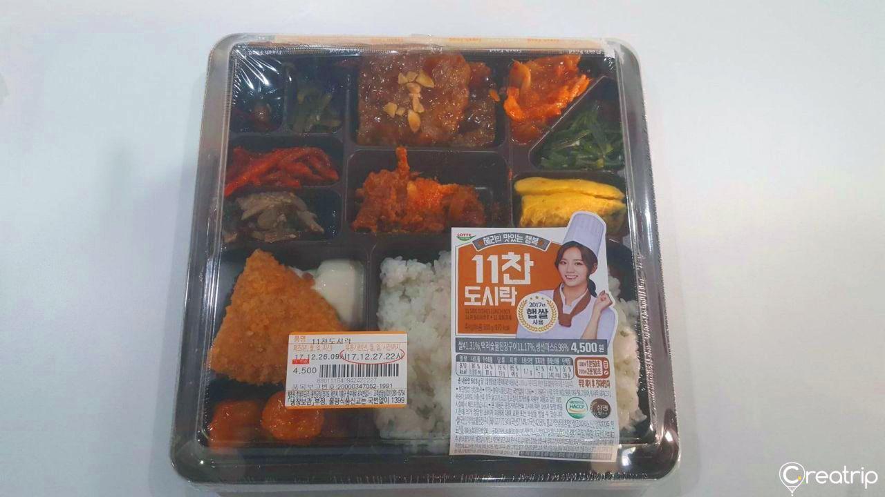 7-11的11餐便当包装，展示丰富的韩国便当选择和食材细节。