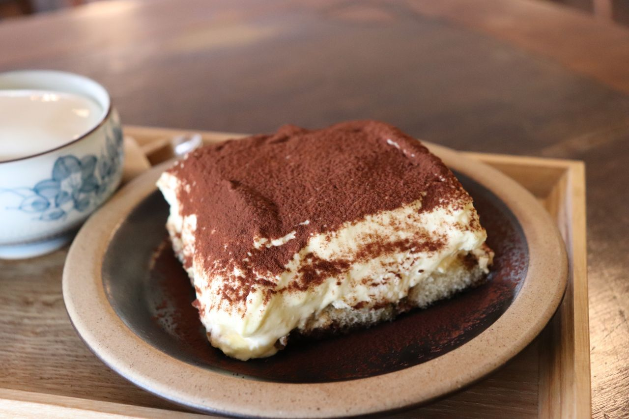 Close-up of tiramisu dessert served at Gabaedo Samcheongdong café