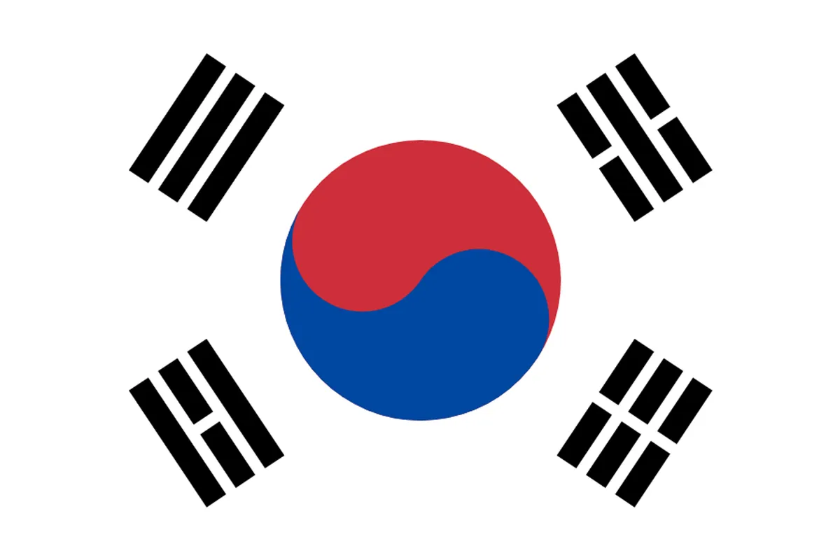 The flag of South Korea featuring its iconic taeguk symbol and black trigrams surrounded by a white background.