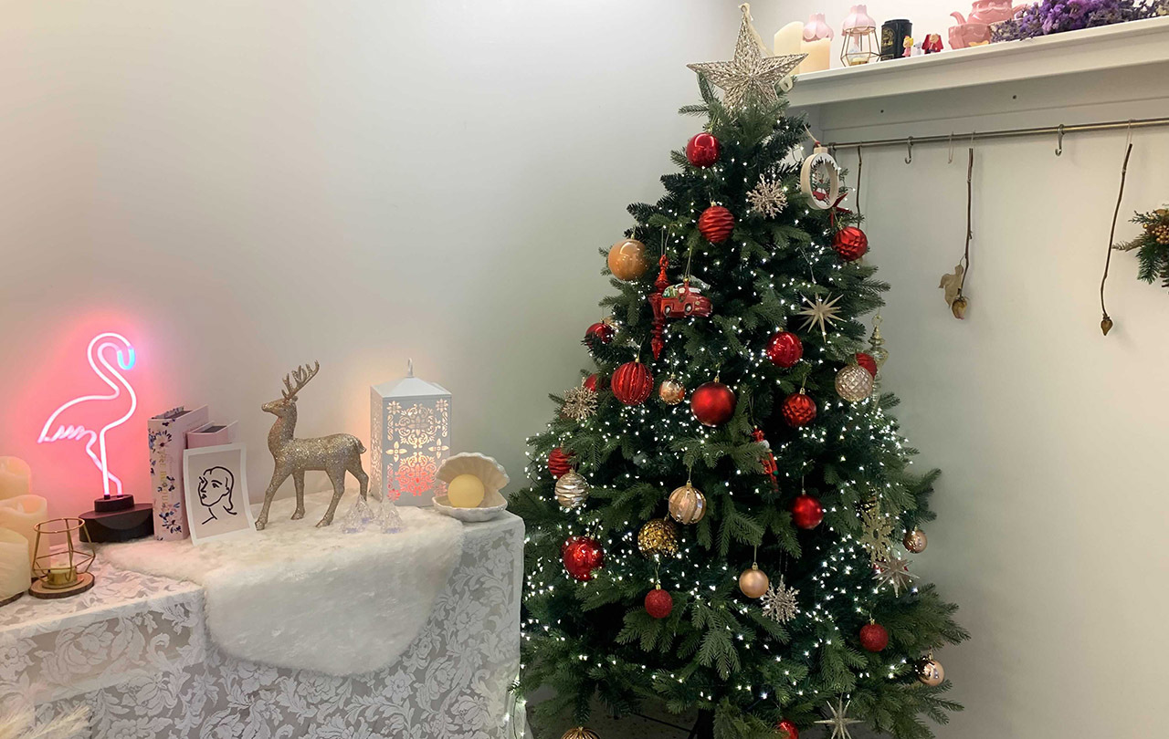 Inside Rachel's Kitchen decorated for a festive season with a beautifully adorned Christmas tree.