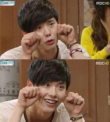 Close-up of a person posing with a playful expression on TV, showcasing Korean entertainment culture.