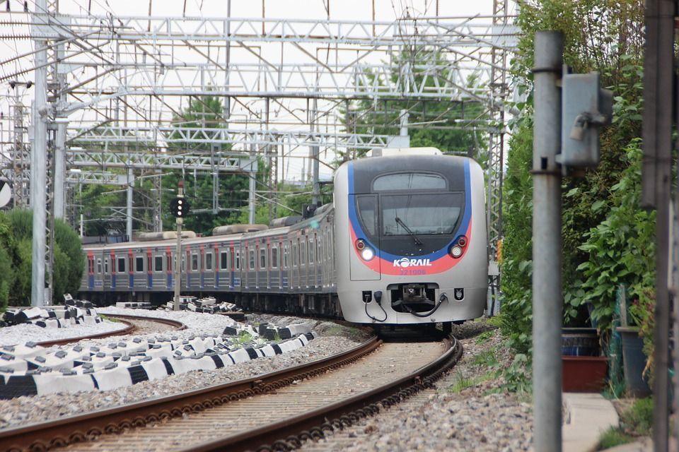 Image of a KORAIL train on the tracks, representing South Korea's efficient railway system connecting key urban centers and regional areas for convenient travel experiences.