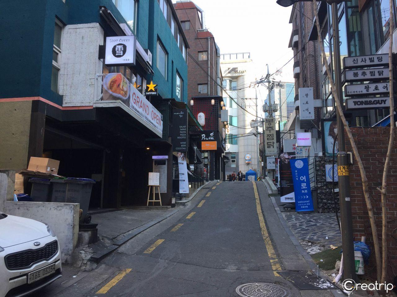 Street view showing small alley leading to Aori Ramen in Gangnam