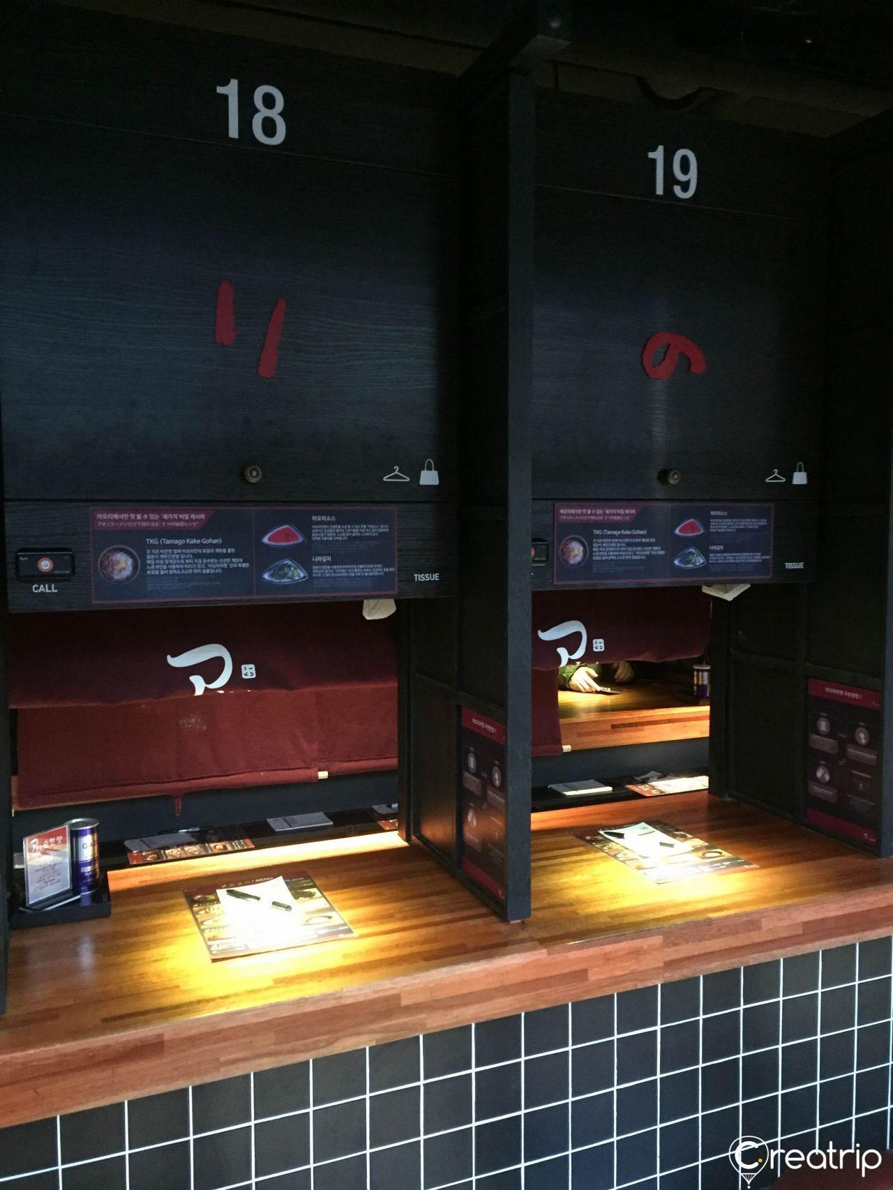 Single seat arrangement at Aori Ramen offering personal dining experience