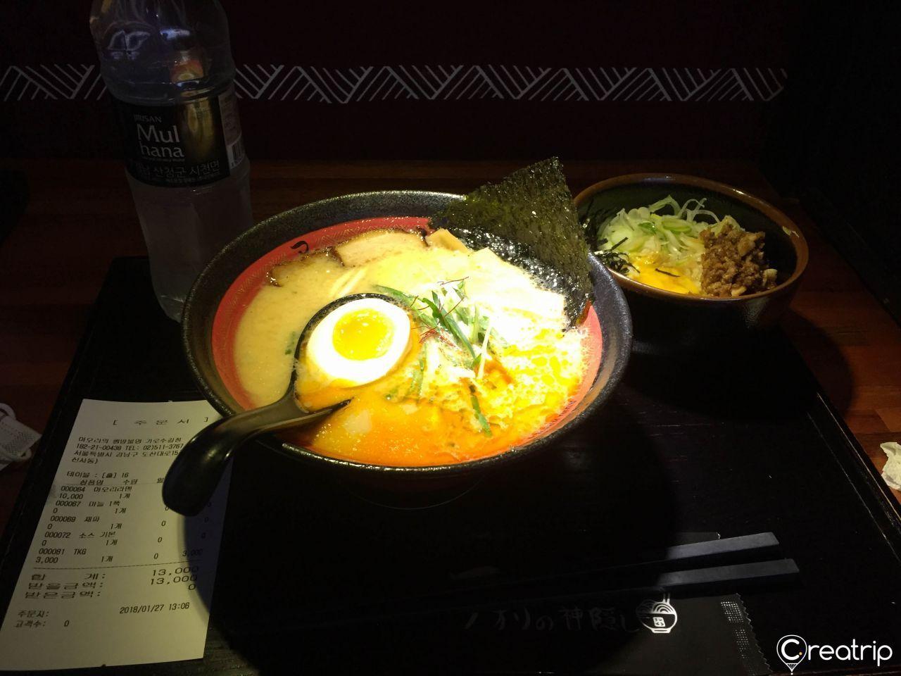 Close-up of a bowl of Aori Ramen featuring their signature broth and toppings