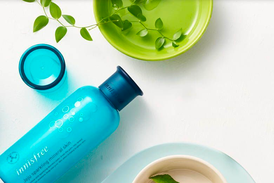 A display of soothing gel, toner, and lotion in a skincare routine backdrop, emphasizing Korean beauty products.