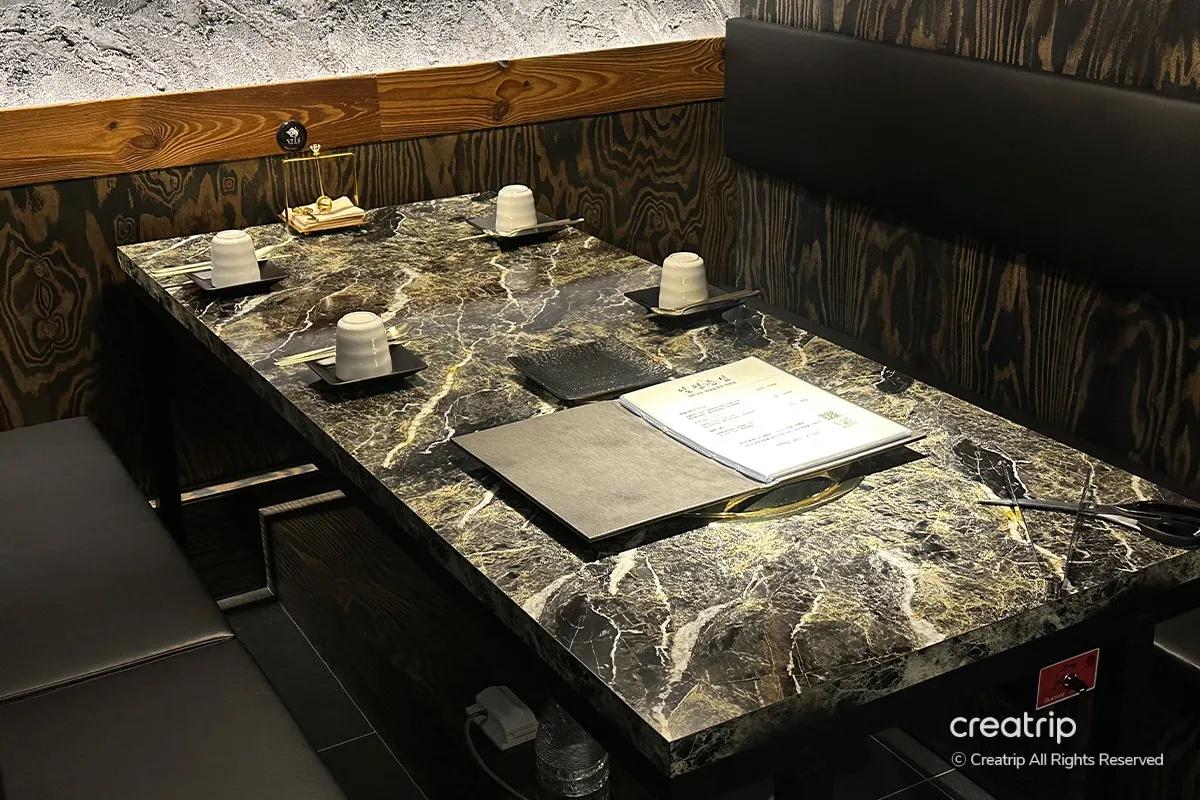 Private booth-style seating at Ilpyeon Sirloin in Myeongdong