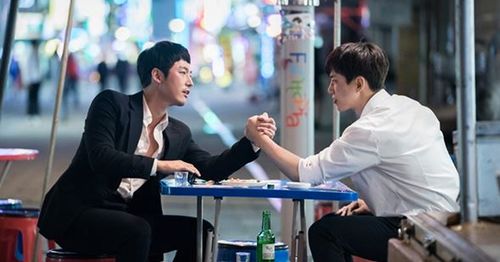 Arm wrestling at the pojangmacha after too many drinks