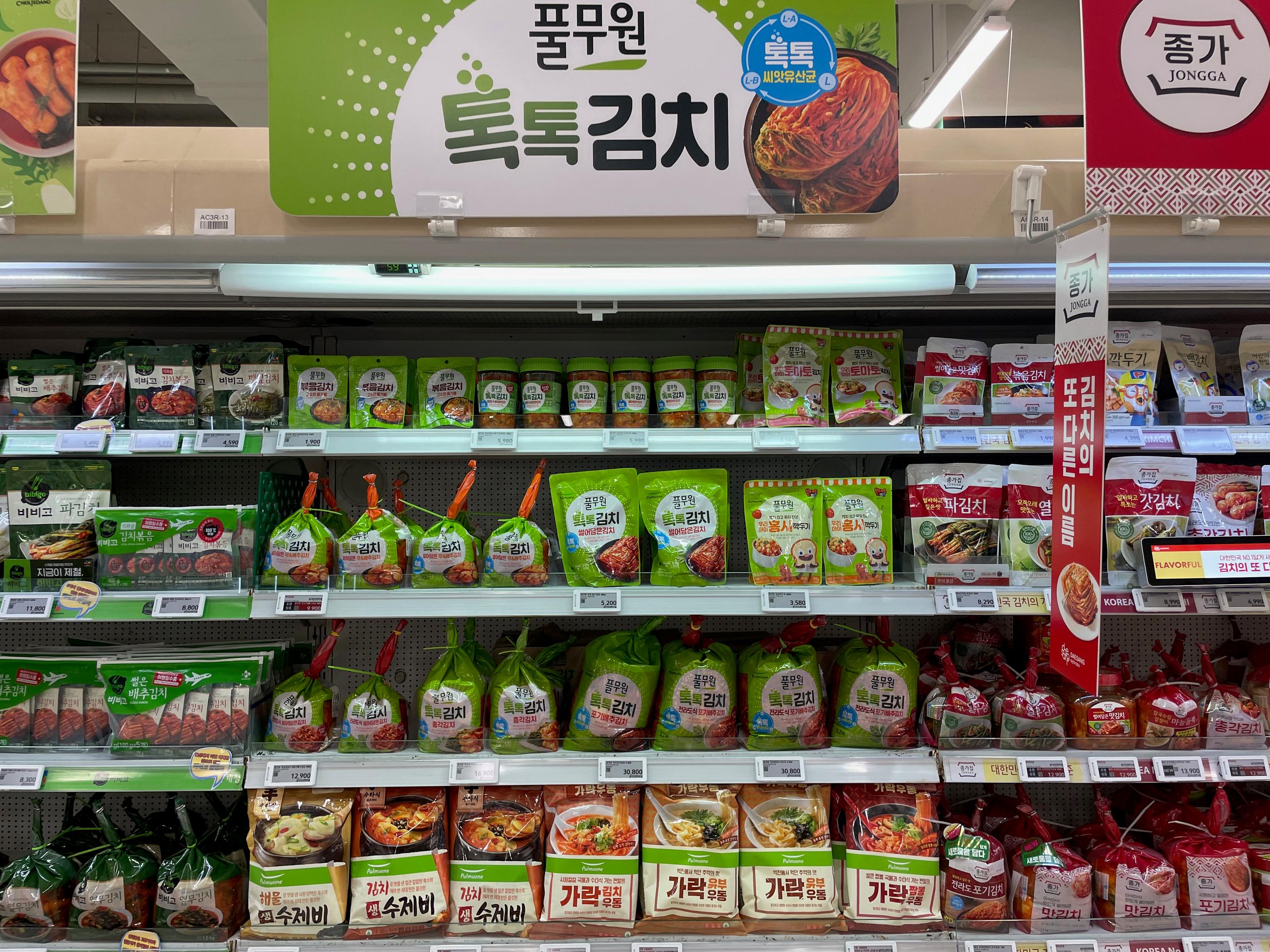 Various packaged kimchi products in Homeplus Hapjeong