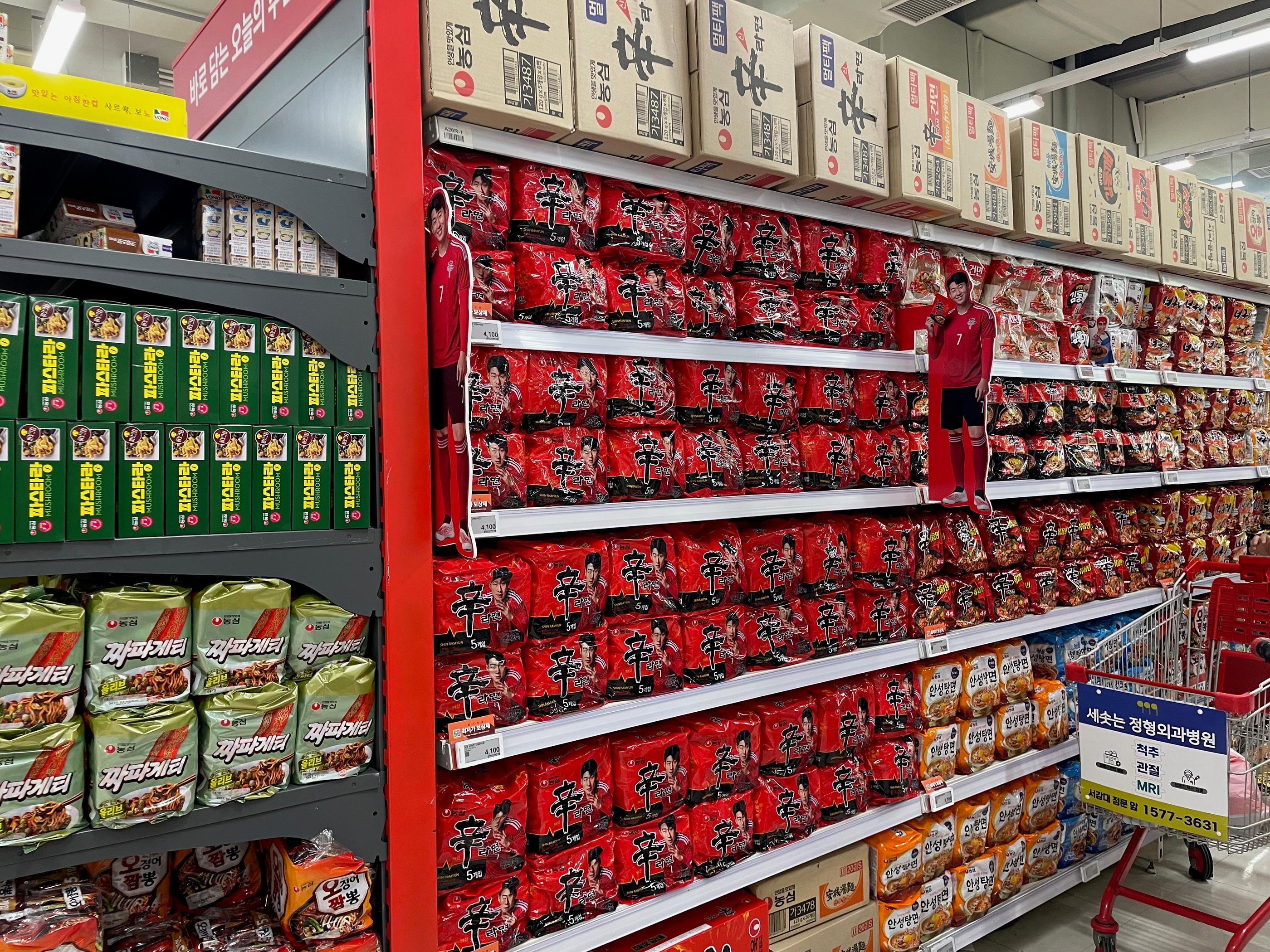 Shin Ramen aisle at Homeplus Hapjeong with Son Heung-min poster