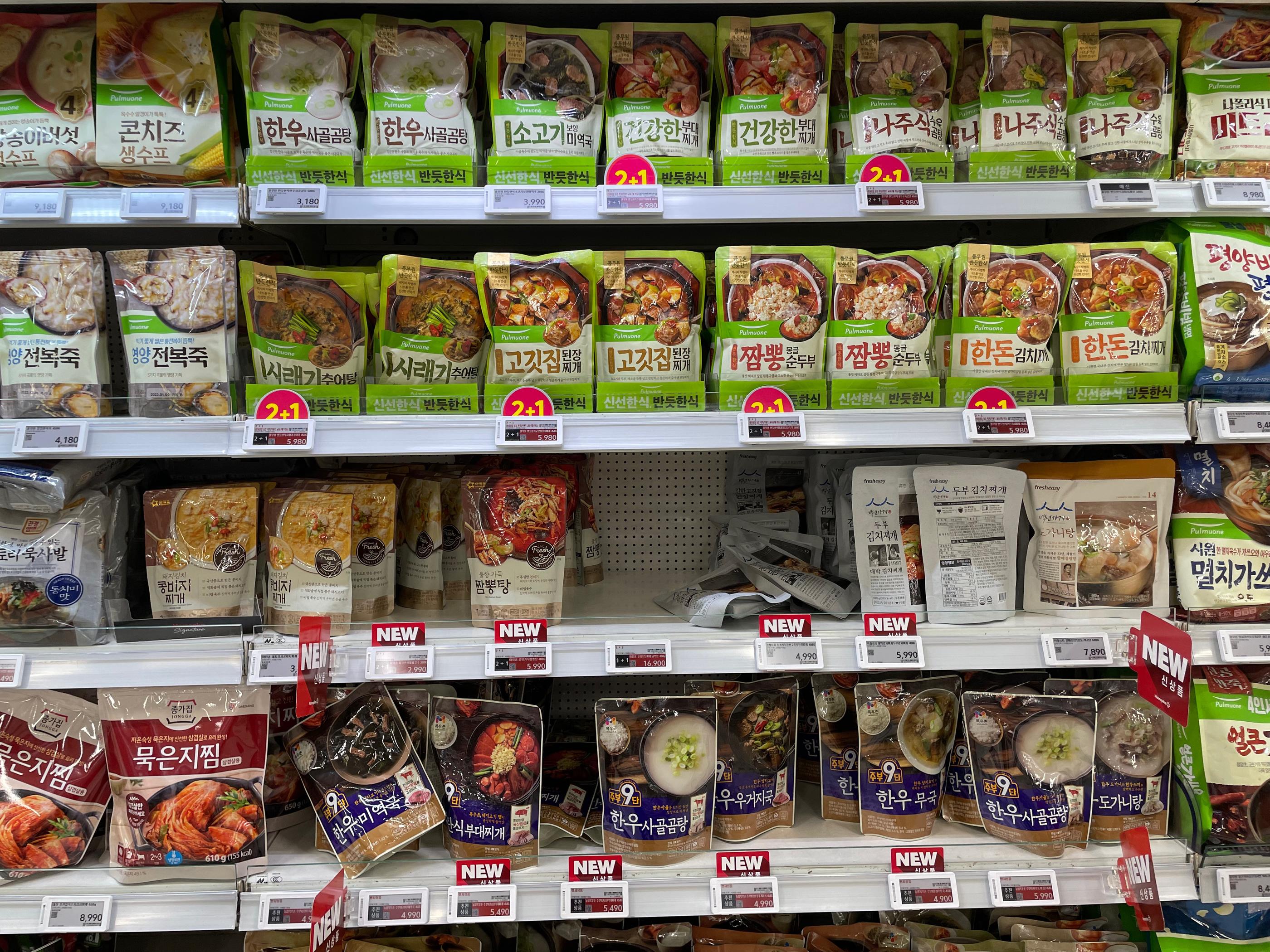 Selection of ready-to-eat Korean congee and stews at Homeplus Hapjeong