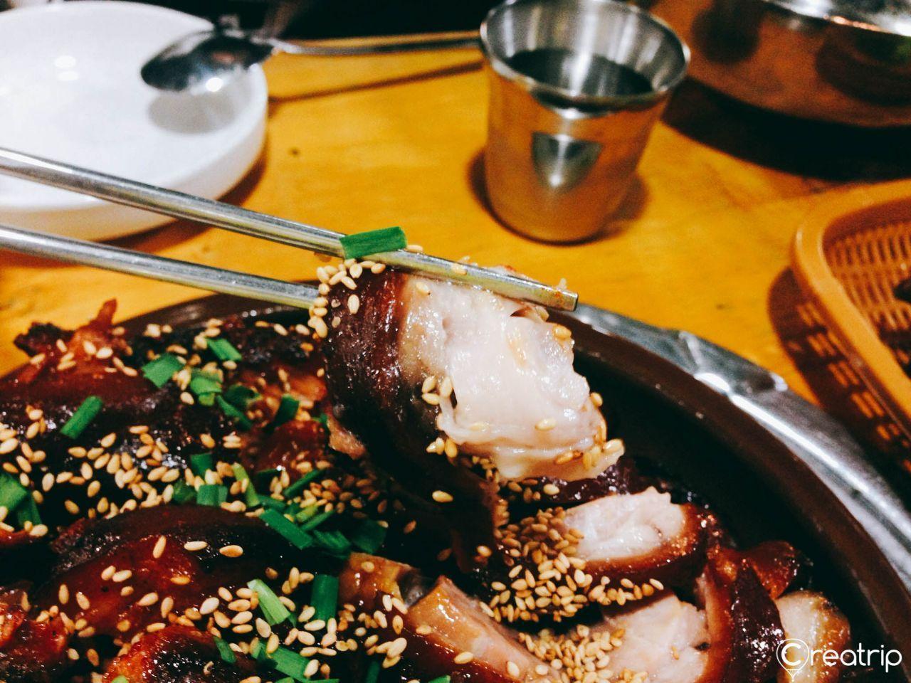 Delicious sliced pieces of Korean pork highlighting the tender and juicy texture from Jokbal restaurant.