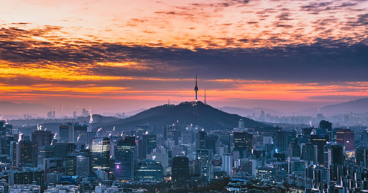 Stunning sunrise over Seoul cityscape highlighting the N Seoul Tower