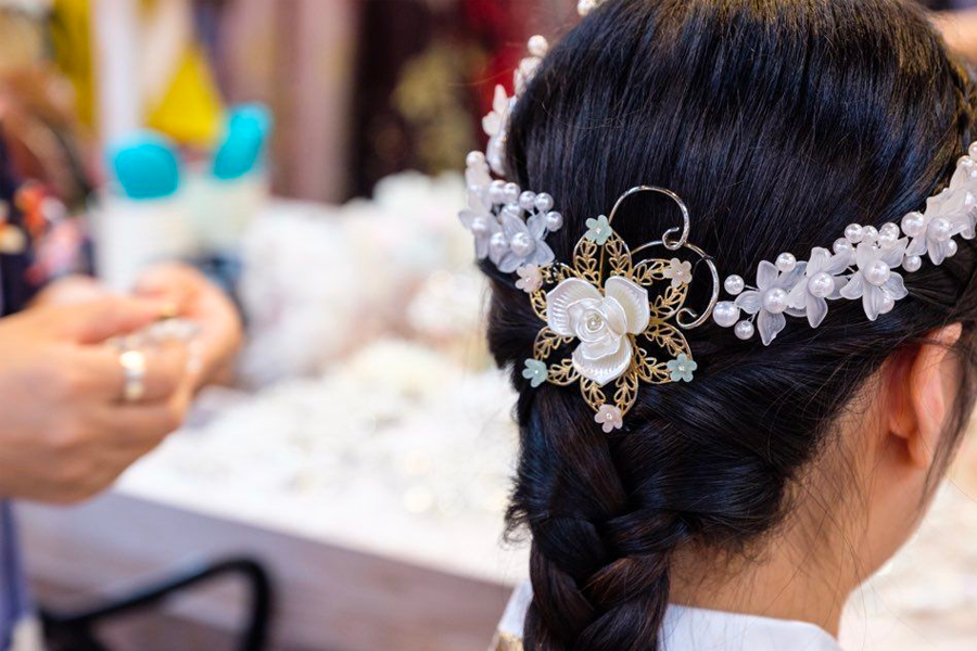 Hanbok on elegant display inside 'Ohneul Haru Hanbok' for guests to choose from.