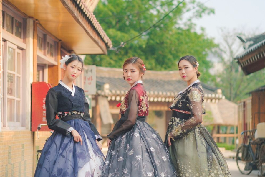Spectacular view of hanbok display inside 'Ohneul Haru Hanbok' shop with vibrant designs.