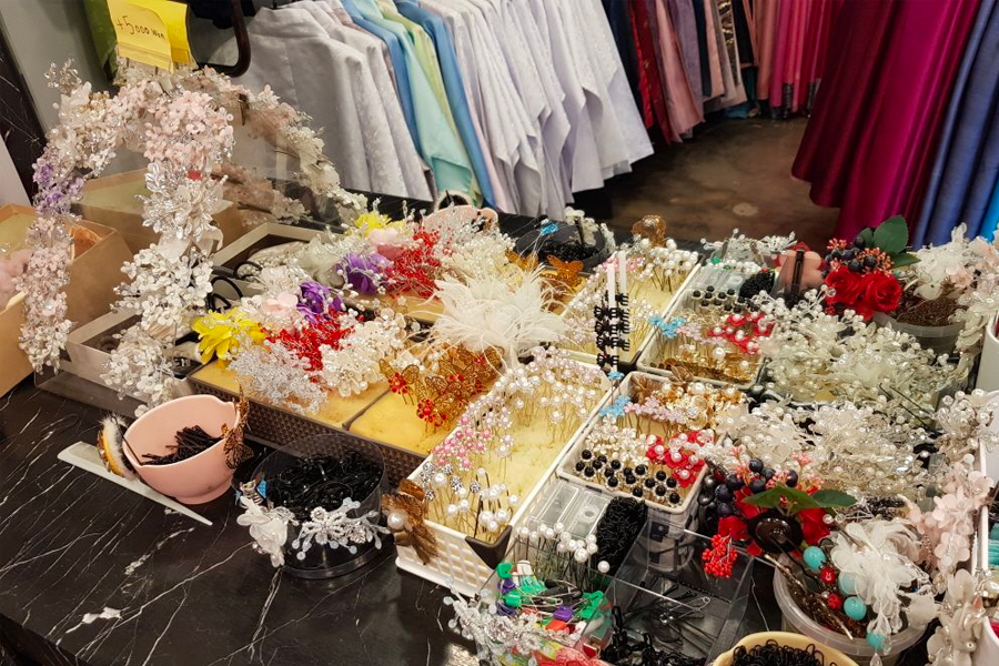 Close-up of intricate accessories and hairpins used for hanbok styling.