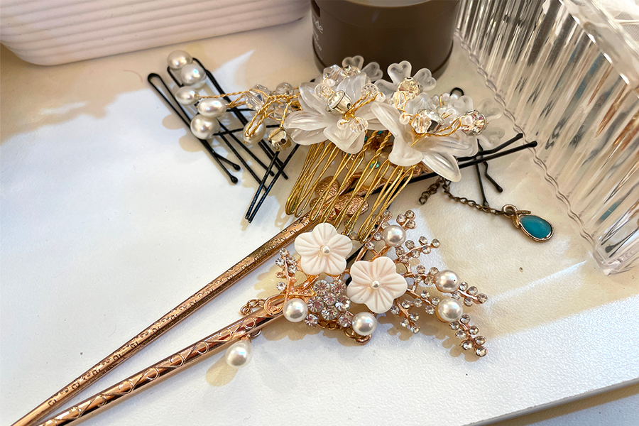 Collection of traditional Korean hair accessories including elegant pins and combs.