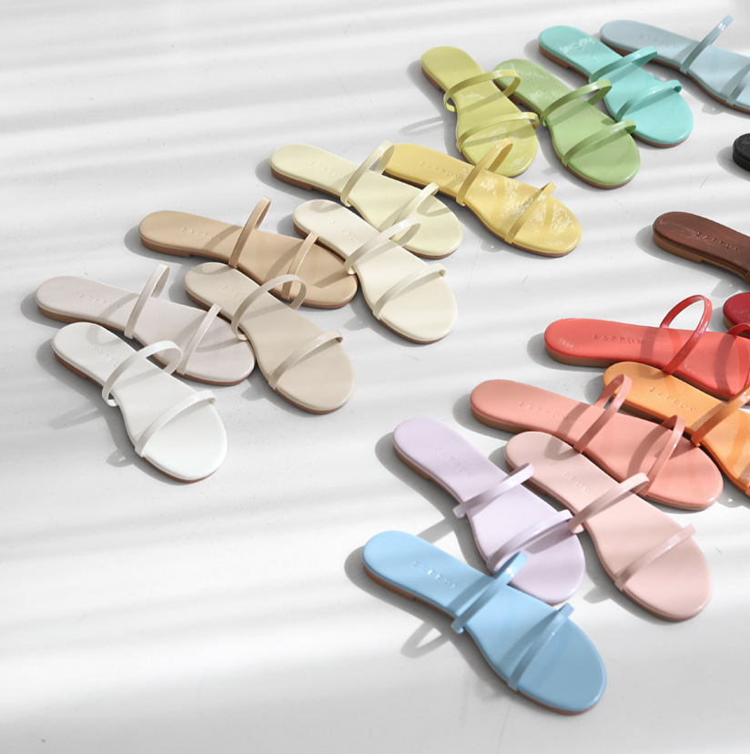 Minimalist sandals in a range of pastel colors from SAPPUN, highlighting the brand’s focus on chic and comfortable spring footwear.