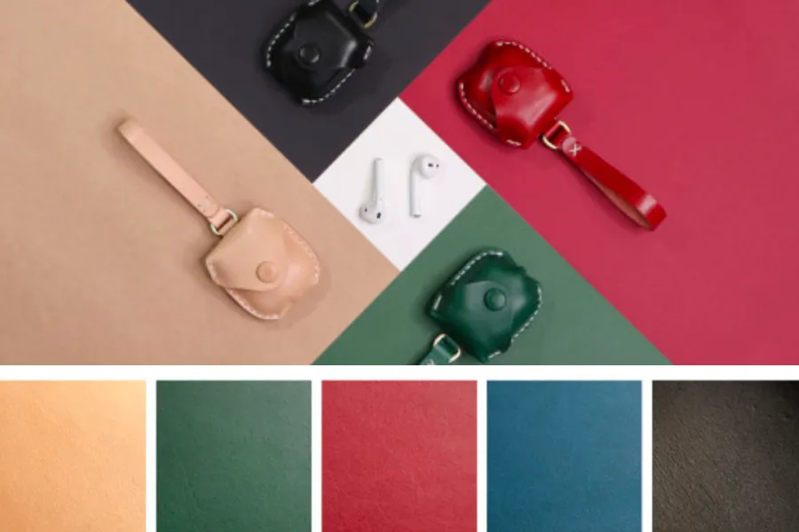 Selection of colorful leather AirPod cases from Korean DIY leather workshop, combining fashion with functionality.