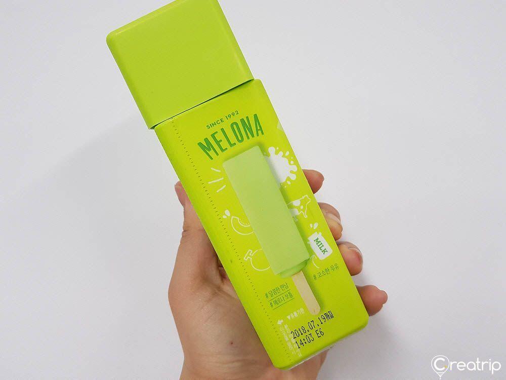 Package of liquid melon ice cream bar Melona drink in a vibrant green design