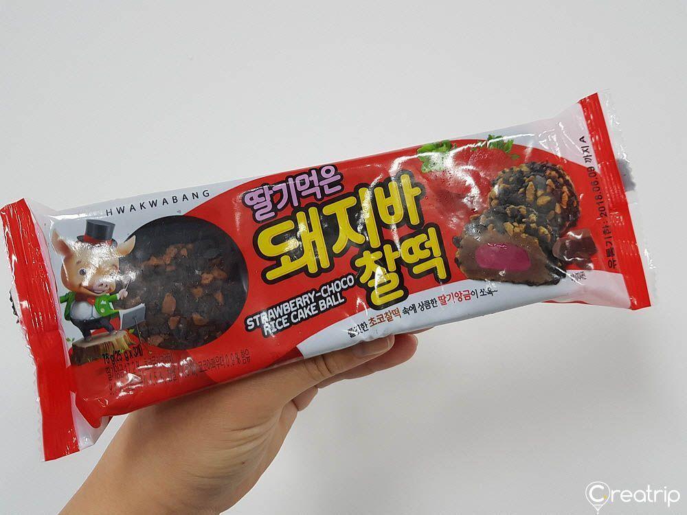 Package of strawberry chocolate rice cake balls inspired by Korean piglet ice pops