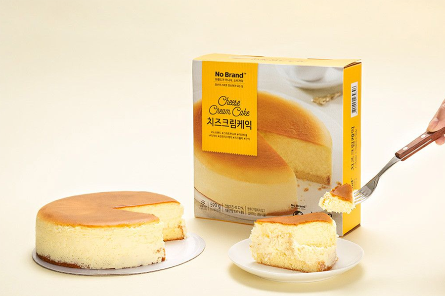 No Brand cheese cream cake served on a neutral backdrop, highlighting the cake's appealing layers and light texture, ready to satisfy any dessert craving.