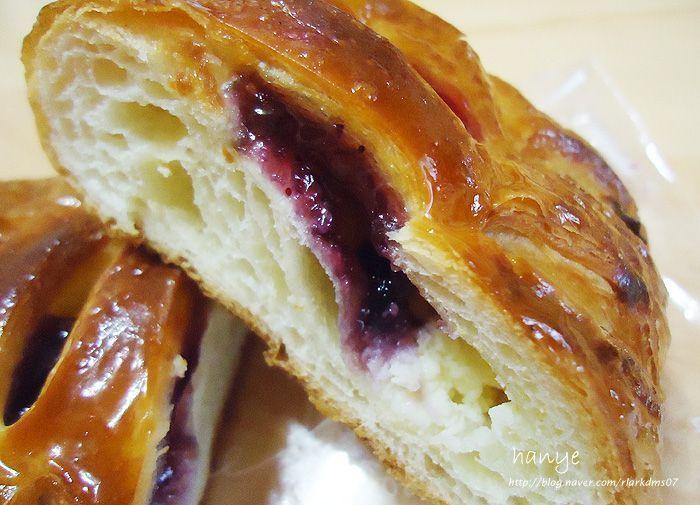 Close-up of inside Blueberry Cream Cheese Pastry - Showcasing the oozing blueberry and cream cheese filling.