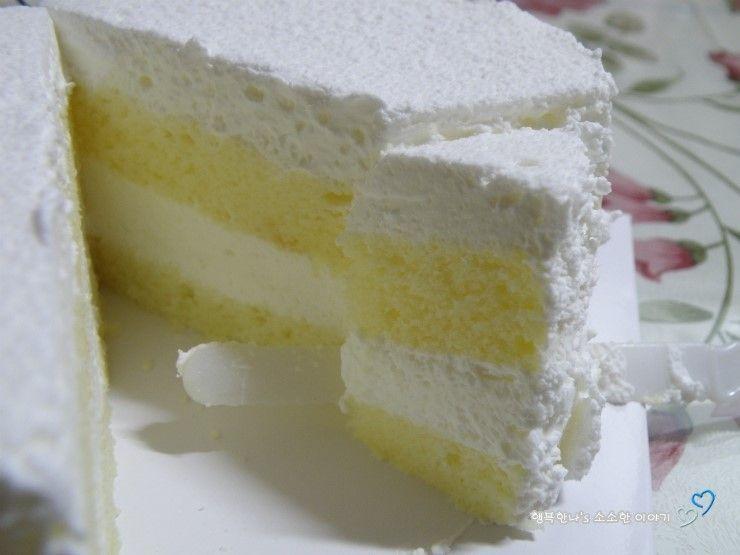 Inside View of Paris Baguette Milk Cake - Highlighting the airy sponge layers and light milk cream filling.