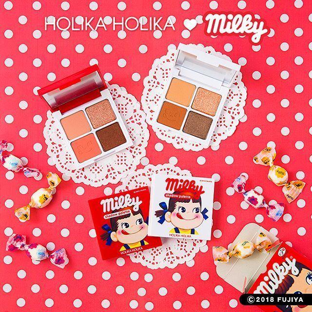 Publicité pour la collaboration Holika Holika avec Milky, présentant des palettes de fards à paupières à thème sucré sur fond rouge à pois blancs.